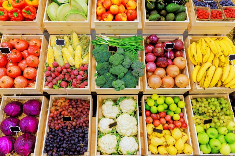 Baskets filled with various fruits and vegetables at a farmer market