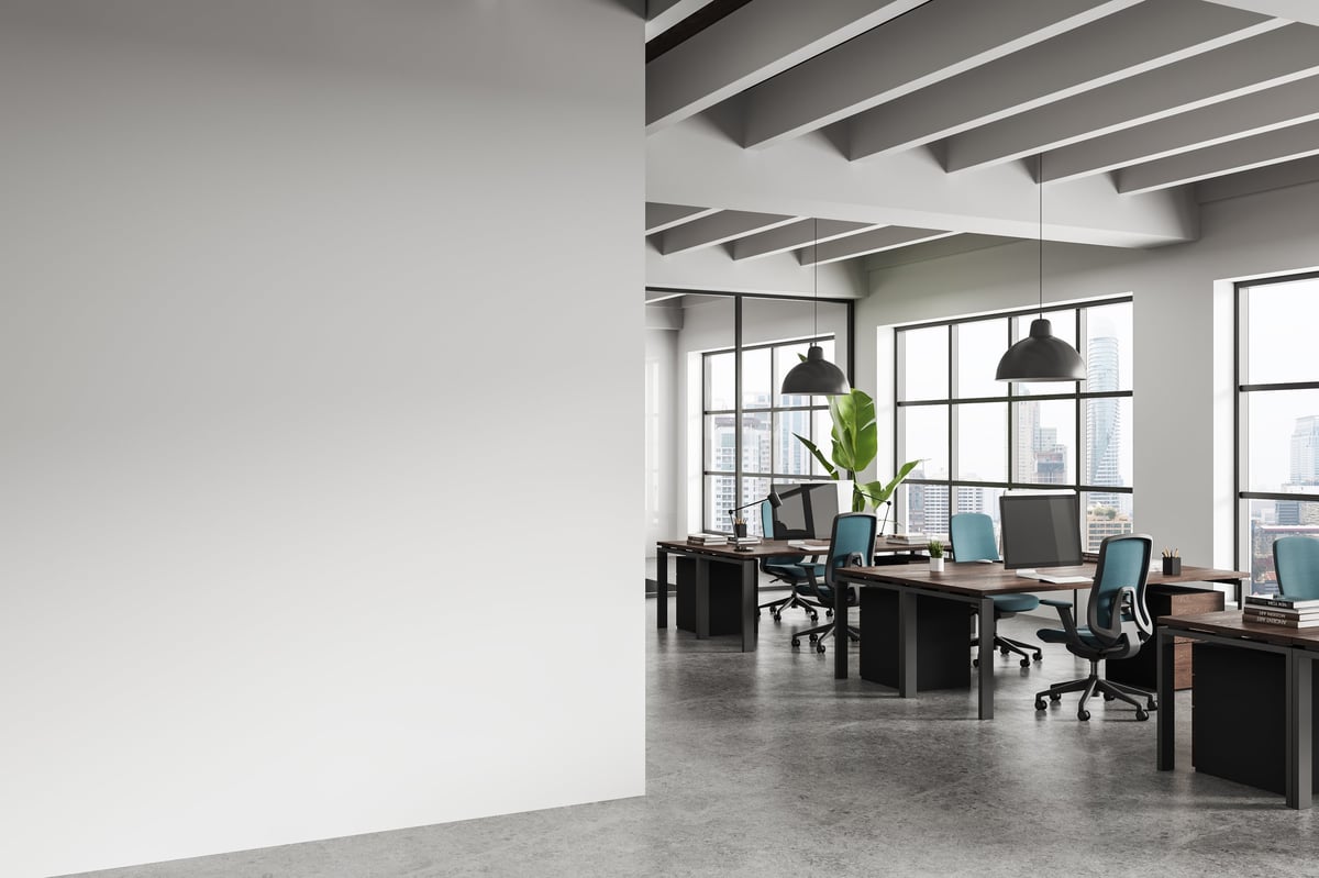 Contemporary office interior with clean empty wall for poster mockup, realistic style, modern workspace background, concept of creative presentation layout. 3D Rendering